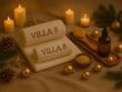 Festive spa flatlay at Villa 8 Ladies Salon & Spa in Jumeirah, Dubai, featuring embroidered Villa 8 towels, pine branches, candles, golden ornaments, a wooden brush, massage oil, and a bowl of salts arranged in a warm holiday setting.