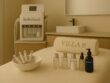 HydraFacial treatment setup at Villa 8 Ladies Salon & Spa in Jumeirah, Dubai, featuring a professional facial device, hydra tips, a Villa 8 towel pillow, and a clean clinical-style workspace in soft neutral tones